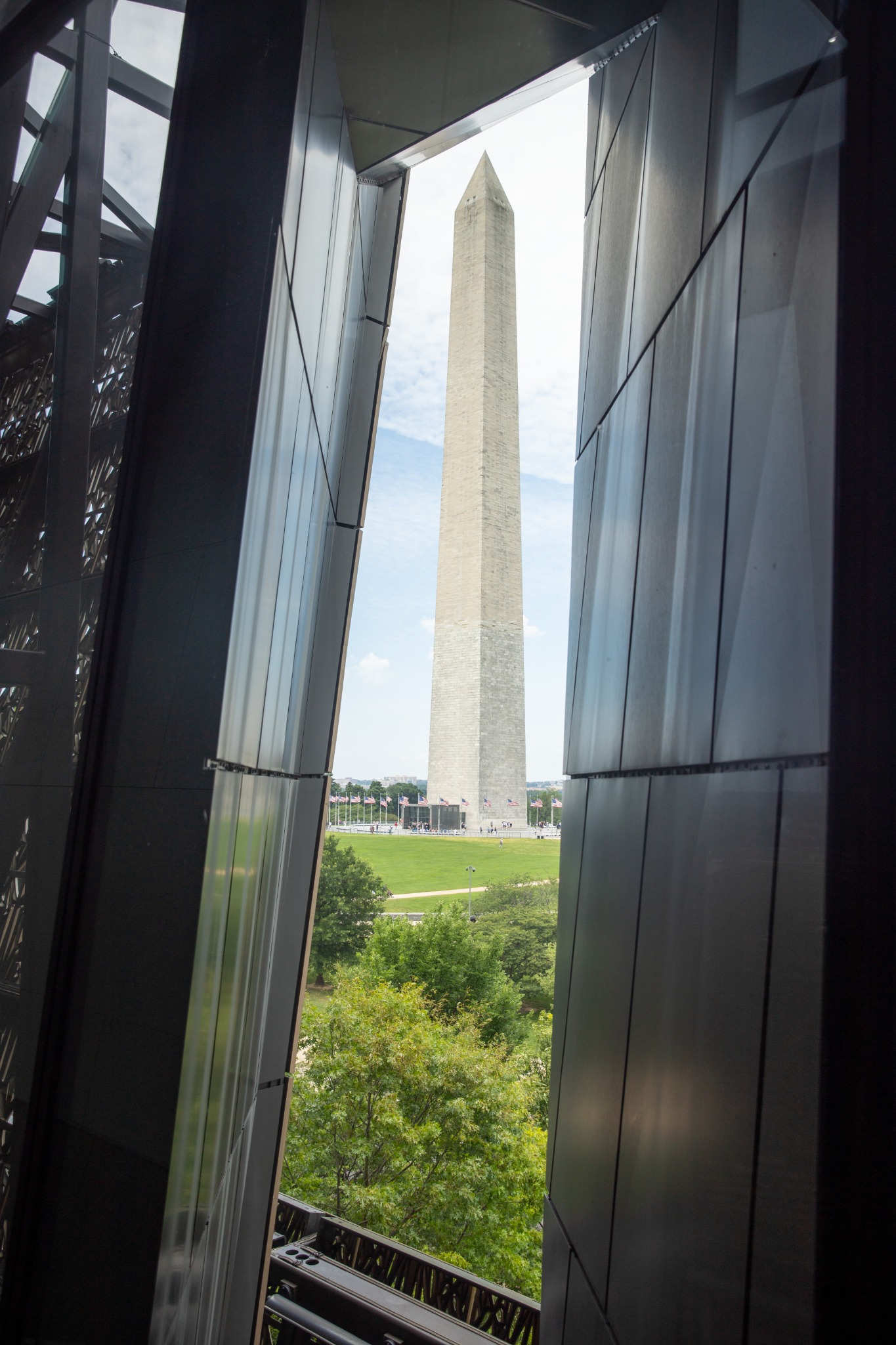 Washington Monument framed by the National Museum of African American History and Culture